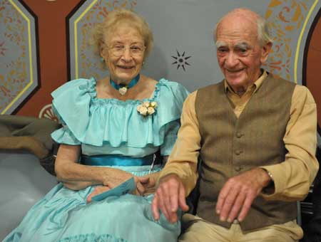 Old couple sitting at 2009 Ball
